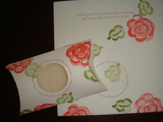Floral pillow box favor with a round window and matching personalized card